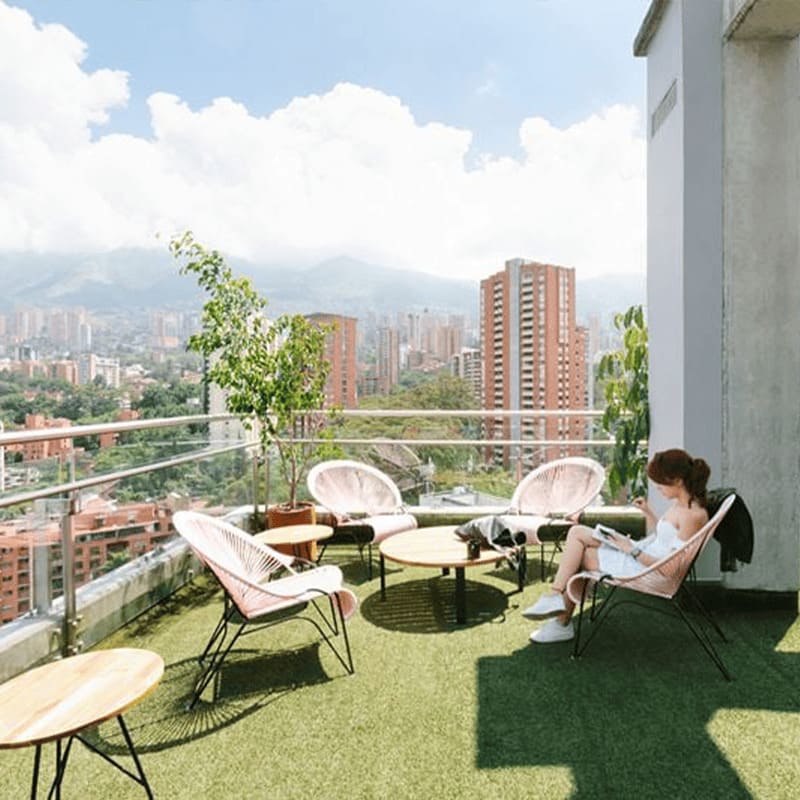 A freelancer sitting at WeWork Offices in Medellin