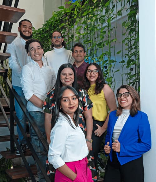 A group of freelancers smiling to the camera