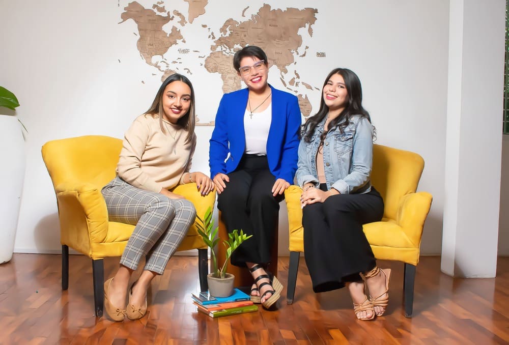 A group of recruiters sitting and smiling